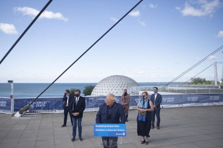 Ontario Premier Doug Ford stands at the podium as he makes an announcement at Toronto’s Ontario Place, on Friday July 30, 2021. Ford says he likes the idea of moving the Ontario Science Centre from east Toronto to the downtown site of Ontario Place.