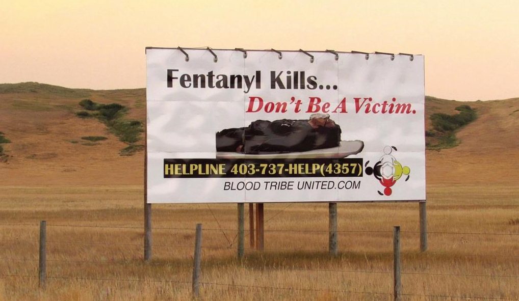A billboard at the east end of the Blood Reserve in southern Alberta, shown on April 27, 2018, warns about the dangers of fentanyl. THE CANADIAN PRESS/Bill Graveland.