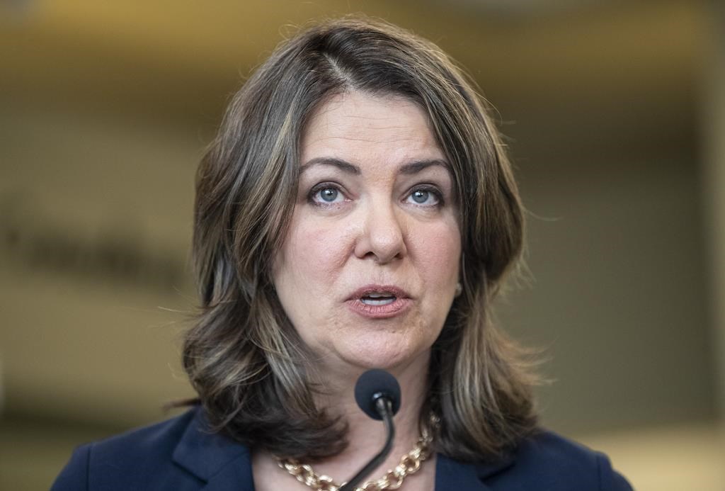 Alberta Premier Danielle Smith announces a public health guarantee in Sherwood Park, Alta., Tuesday, April 11, 2023. Smith is reversing part of her government’s new media-question restriction policy, but says she will continue to limit queries in order to provide more answers.