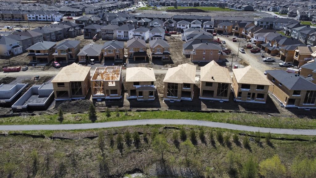 New homes are built in a housing development in the west-end of Ottawa on May 6, 2021. THE CANADIAN PRESS/Sean Kilpatrick.