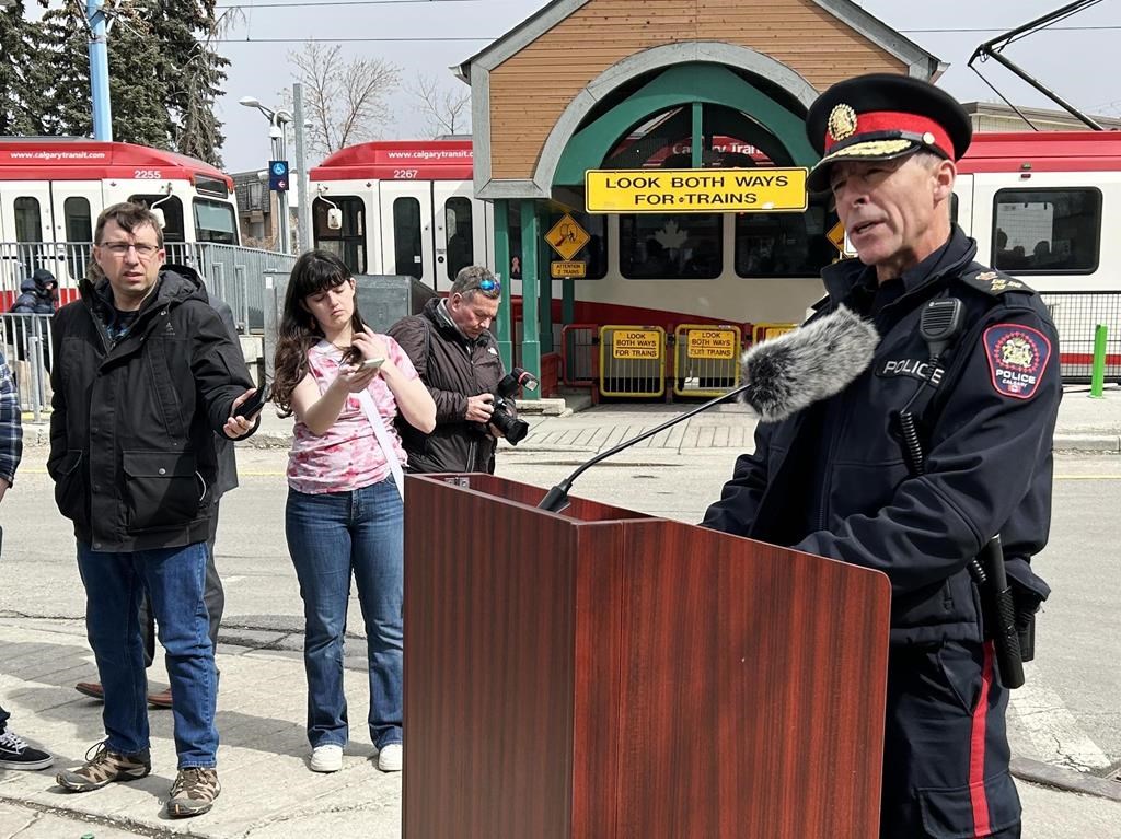 Calgary police Chief Mark Neufeld talks to reporters on Thurs. April 13, 2023, near the scene of a shooting in the Kensington business district in Calgary.
