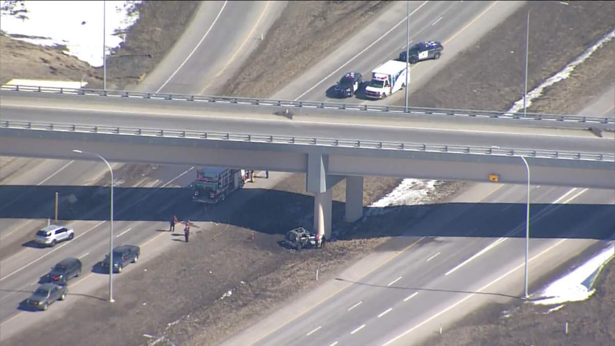 Emergency crews attend a fatal collision on Highway 22X in the southwest corner of Calgary, on April 6, 2023.