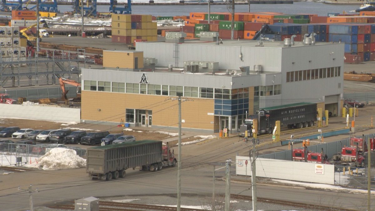 American Iron and Metal, a Saint John scrap metal yard, has pleaded not guilty to four charges related to a workplace death last summer.