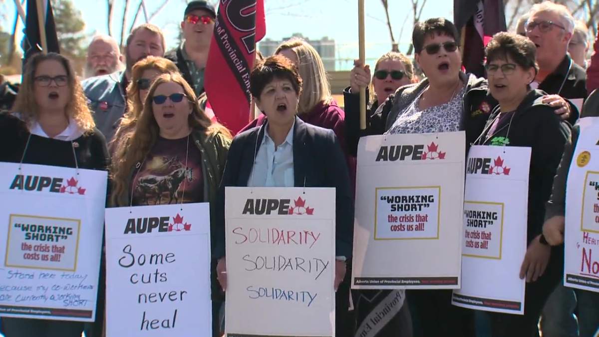 Members of the Alberta Union of Provincial Employees speaking out about staffing shortages across the province outside the legislature on Tuesday, April 18, 2023.