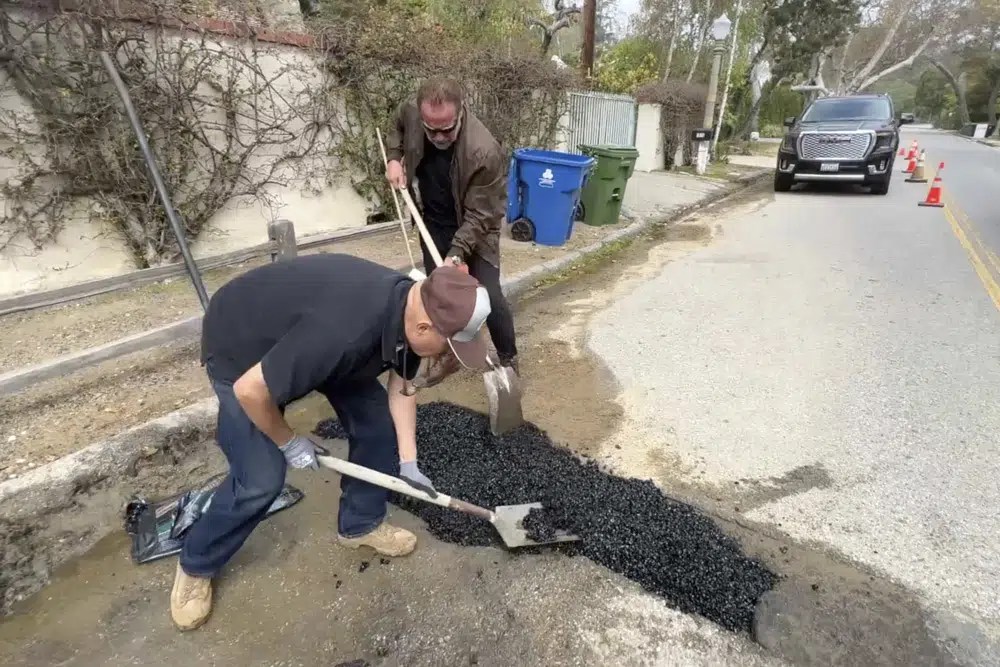 Fed up by an enormous pothole in his neighborhood, Schwarzenegger picked up a shovel and filled it himself. But it was not a pothole.