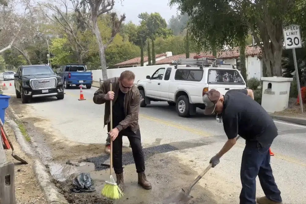 Fed up by an enormous pothole in his neighborhood, Schwarzenegger picked up a shovel and filled it himself. But it was not a pothole.