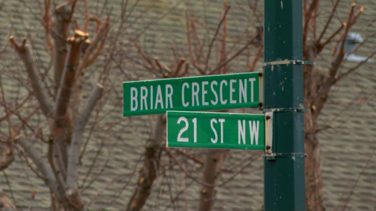 Street signs at the 2000 block of Briar Crescent N.W., where Calgary police say a house was victim of a "violent home invasion" on April 2, 2023.