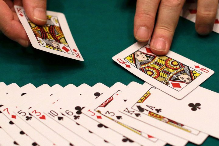In this file photo, a dealer resets a deck of cards at a casino in Las Vegas.