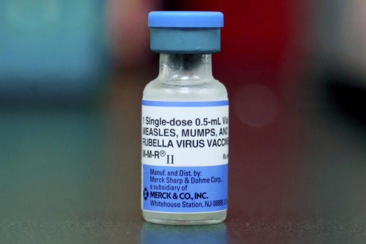 This file photo shows a vial of a measles, mumps and rubella vaccine in Mount Vernon, Ohio.