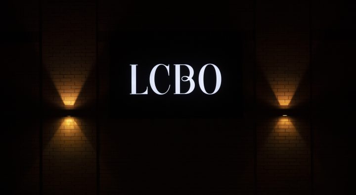 The LCBO logo is illuminated on the wall of a store Tuesday March 30, 2021 in Ottawa.  