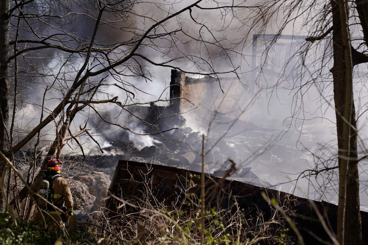 Firefighters continue to pour water on an industrial fire in Richmond, Ind., Wednesday, April 12, 2023.