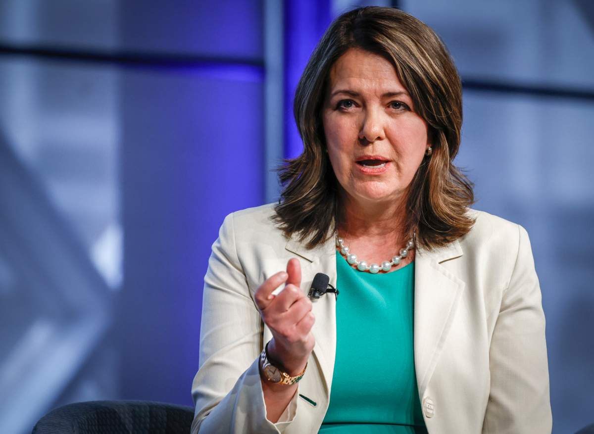 Alberta Premier Danielle Smith gestures as she speaks at an economic forum in Calgary, Alta., Tuesday, April 18, 2023.