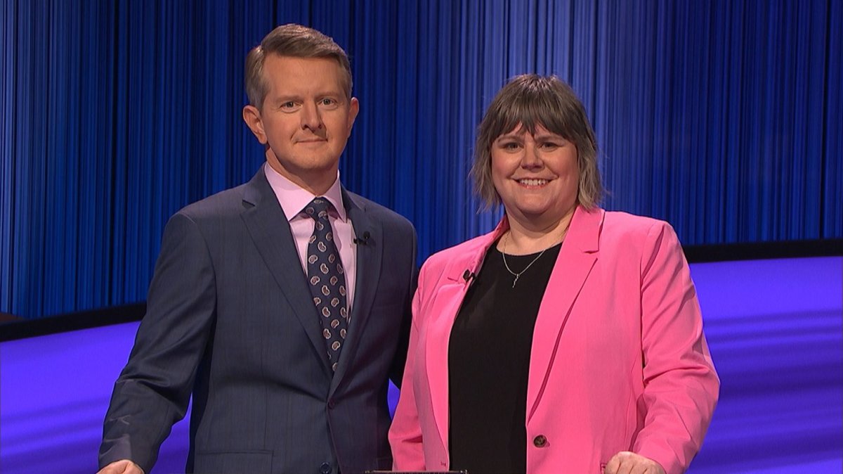 Winnipeg Jeopardy! winner Emma Hill Kepron with host Ken Jennings.