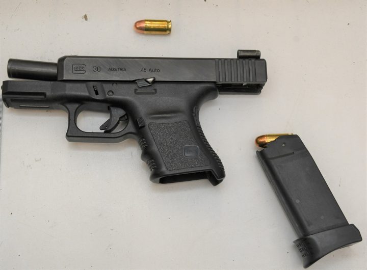 Police said officers found drugs, a loaded firearm and a loaded magazine.