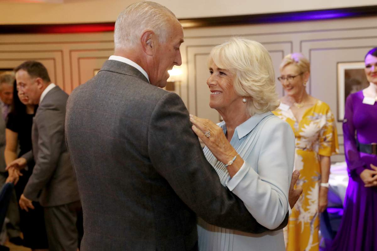Camilla and Len Goodman dance.