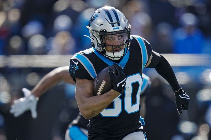 Carolina Panthers running back Chuba Hubbard runs during the first half of an NFL football game between the Carolina Panthers and the Detroit Lions on Saturday, Dec. 24, 2022, in Charlotte, N.C.