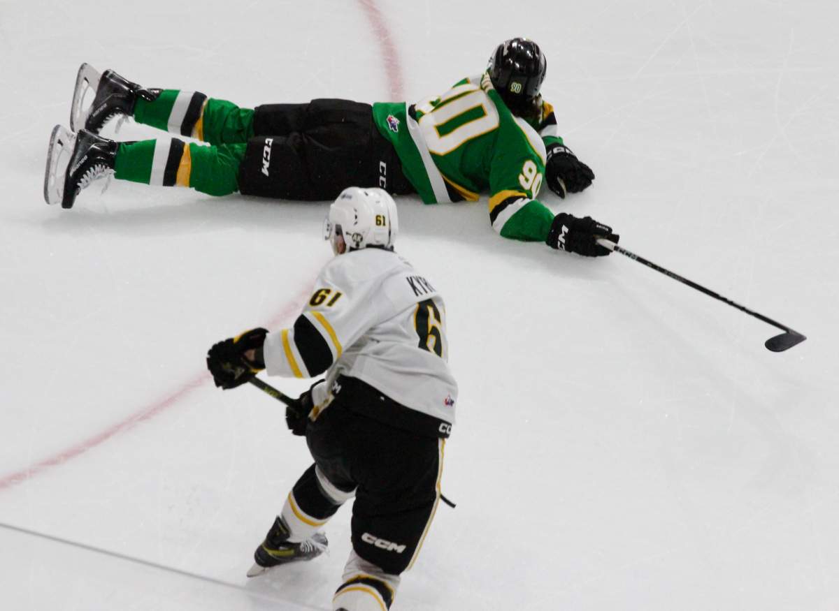 Landon Sim of the London Knights lays out to block a shot.