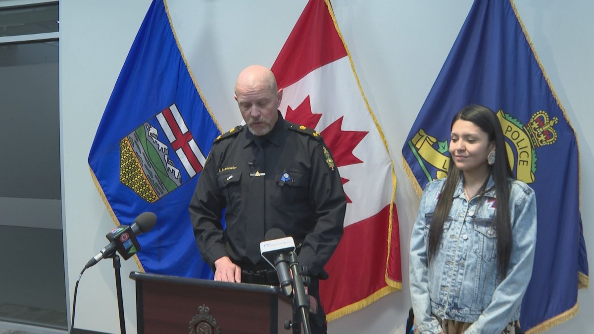 Deputy Chief Gerald Grobmeier and Trissly Blackwater speak at a media conference on April 13, 2023. 