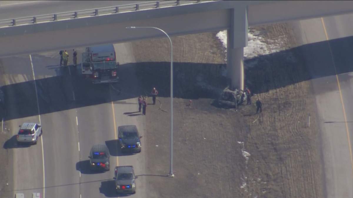 A vehicle is seen at rest beside Highway 22X in the southwest corner of Calgary, on April 6, 2023.