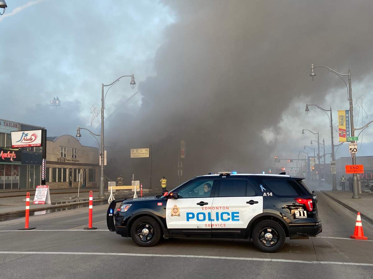 Fire burns at commercial building on Stony Plain Road and 156 Street in Edmonton on Friday, April 14, 2023.