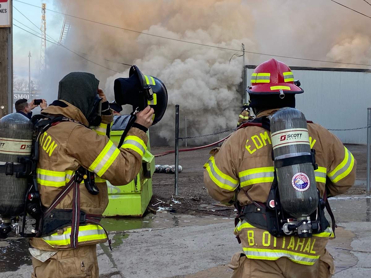 Fire burns at commercial building on Stony Plain Road and 156 Street in Edmonton on Friday, April 14, 2023.