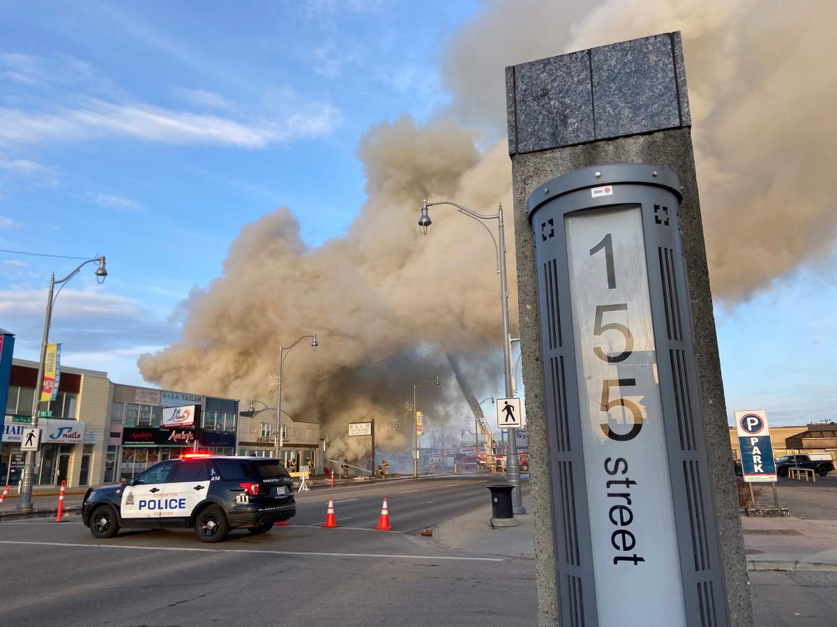 Fire burns at commercial building on Stony Plain Road and 156 Street in Edmonton on Friday, April 14, 2023.