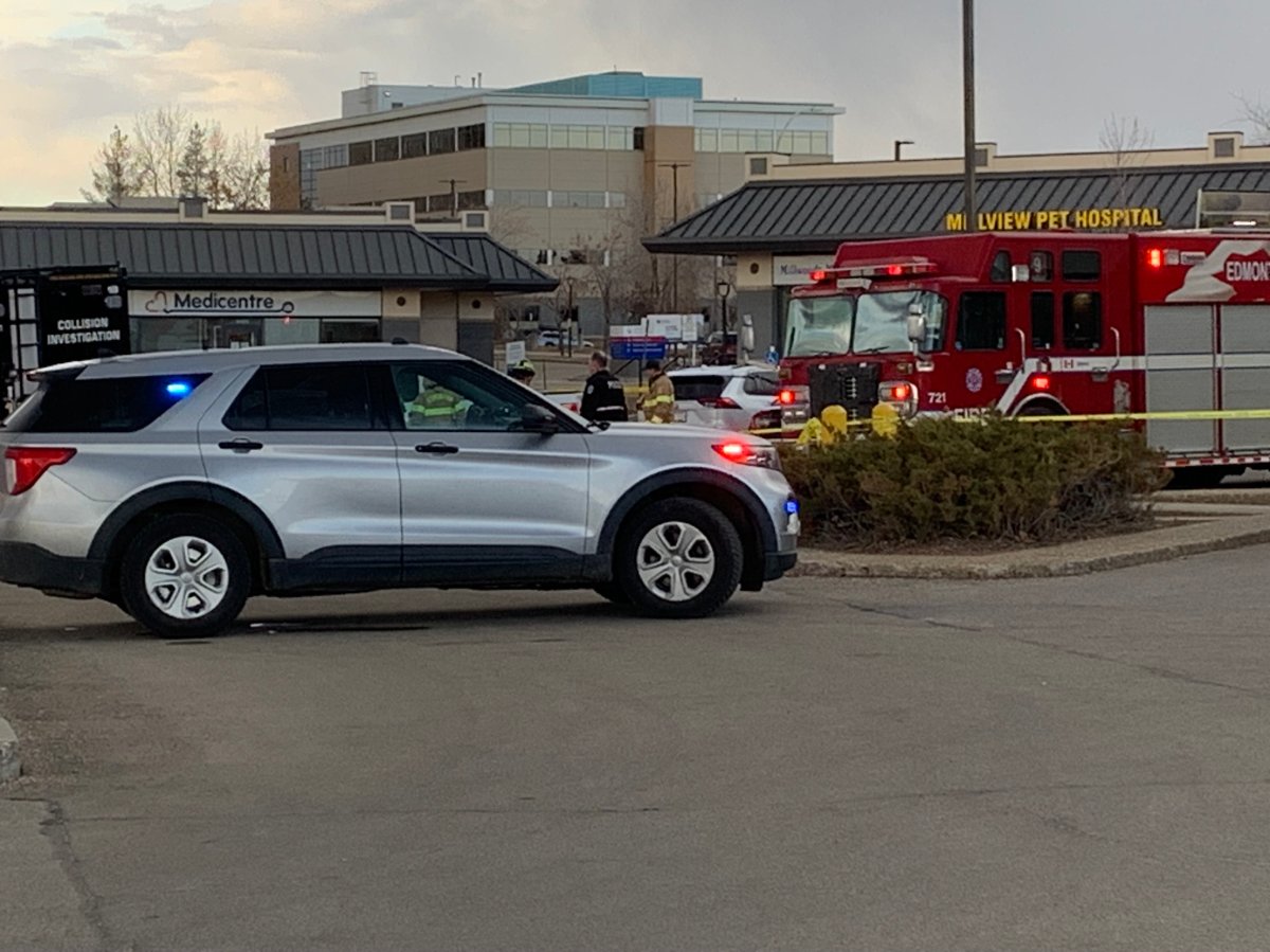 The Edmonton Police Service major collision investigations section at the scene of a fatal pedestrian collision in the Mill Woods Mainstreet shopping plaza near 28 Avenue and Youville Drive on Wednesday, April 12, 2023.