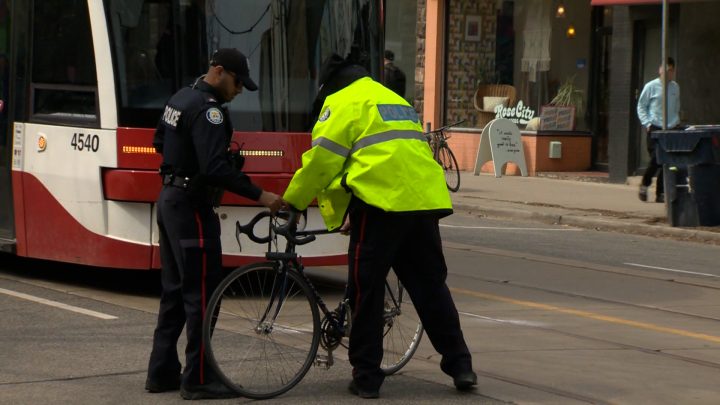 A cyclist was sent to hospital after being struck by a streetcar in Toronto on Saturday, April 8, 2023.