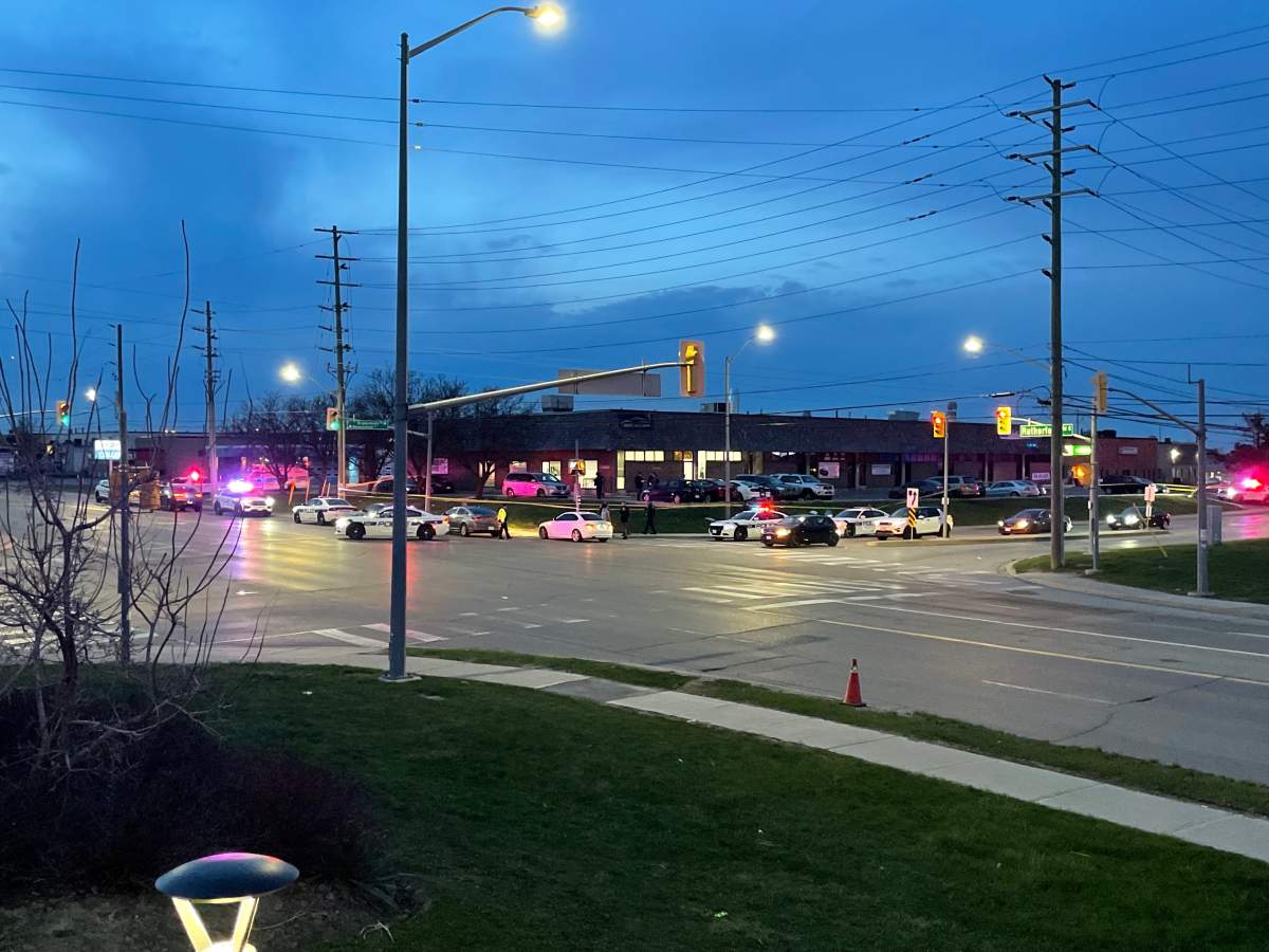 Police at the scene of a fatal shooting near Resolution Drive and Rutherford Road South in Brampton on April 20, 2023.