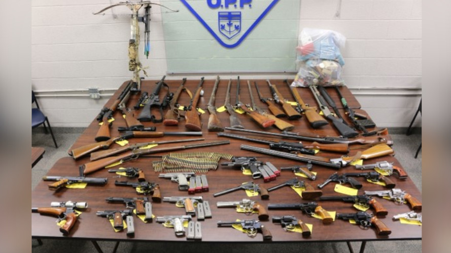 A man from Townsend in Norfolk County is facing charges after close to 40 weapons were confiscated from a residence,.