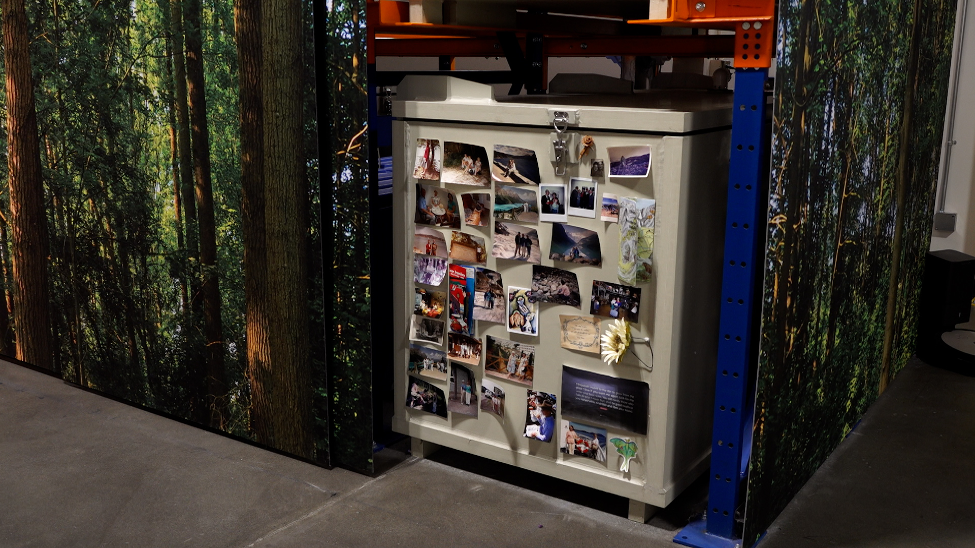Pictures and mementos adorn a vessel for human composting at Return Home