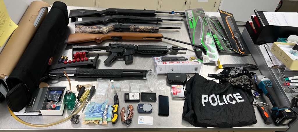 Firearms and other items seized by Okotoks RCMP after a break and enter Saturday, April 8, 2023. 