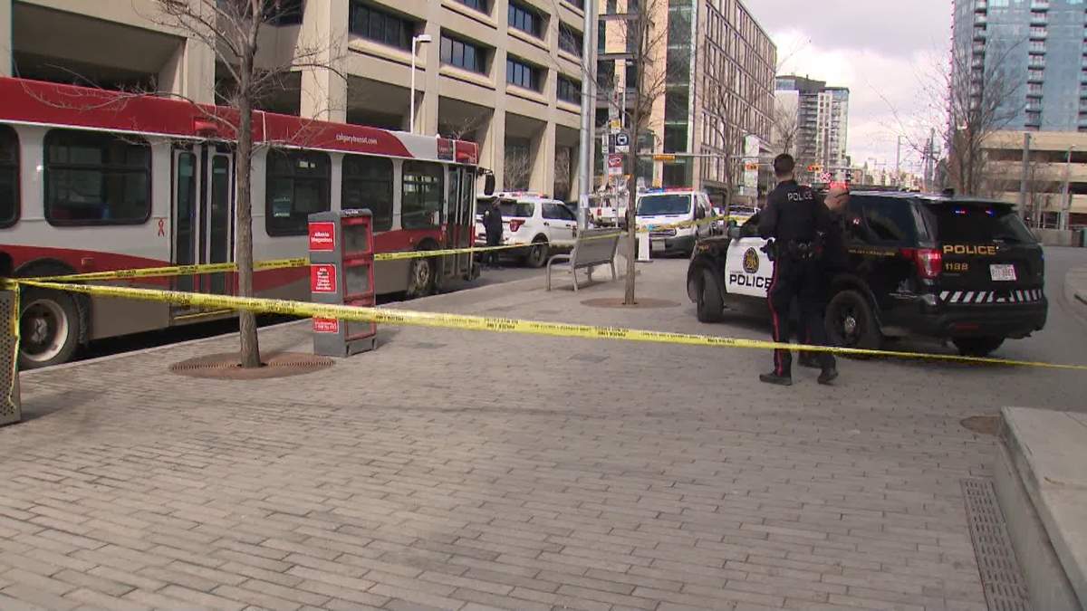 A Calgary Transit bus, pictured on April 12, 2023, is parked in downtown Calgary after an altercation resulted in shots being fired.