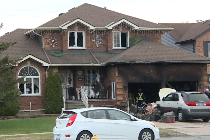 Two residents rush into burning house to help with fire rescue