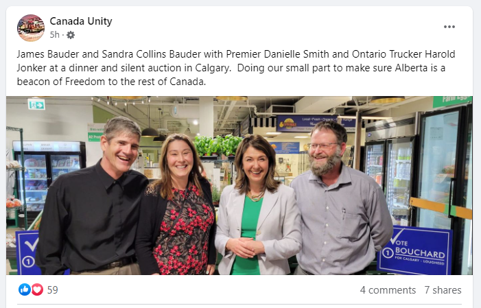 Danielle Smith posed for a photo with James Bauder and his wife Sandra Collins Bauder (left) and Harold Jonker (right) at a fundraising event in Calgary on April 26, 2023.