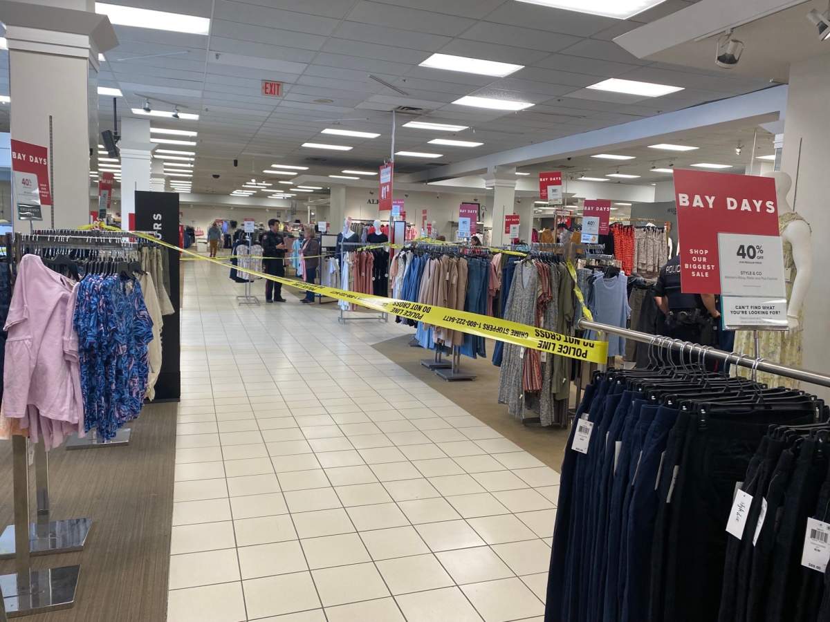Police tape cordons off an area of Hudson's Bay within Sunridge Mall on April 14, 2023.
