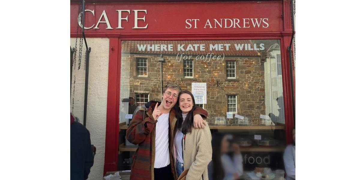 Ed McVey and Meg Bellamy outside a cafe.