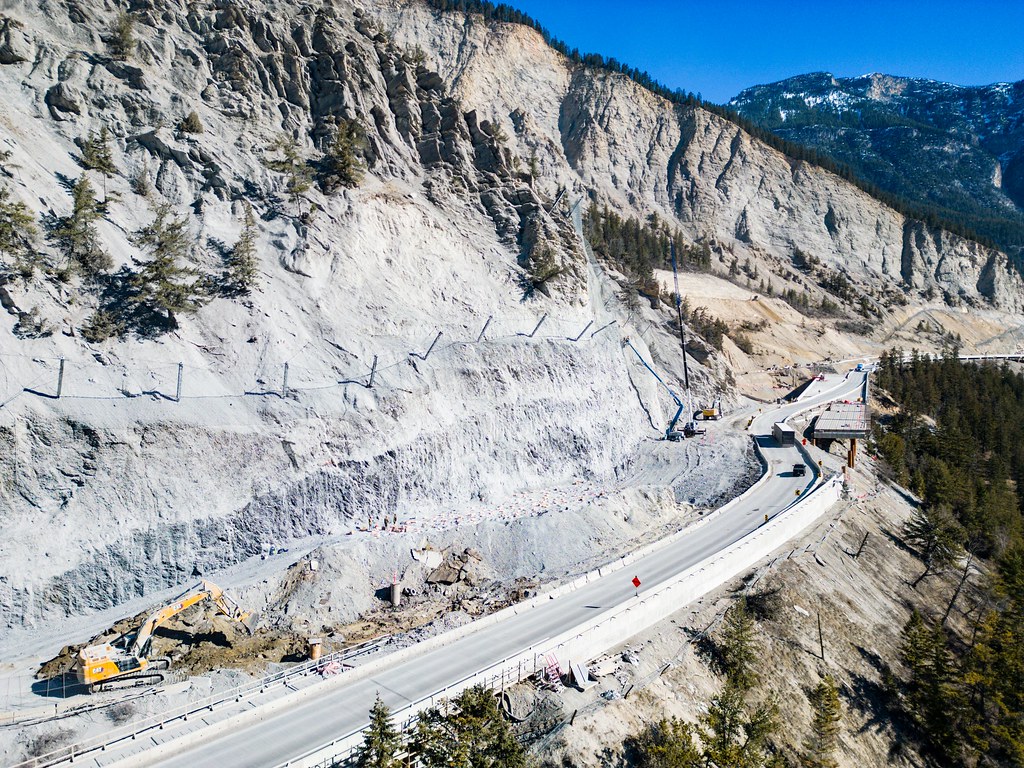An aerial view of ongoing construction along the Trans-Canada Highway near the border of B.C. and Alberta. The Kicking Horse Canyon has been undergoing a major transformation since 2021.