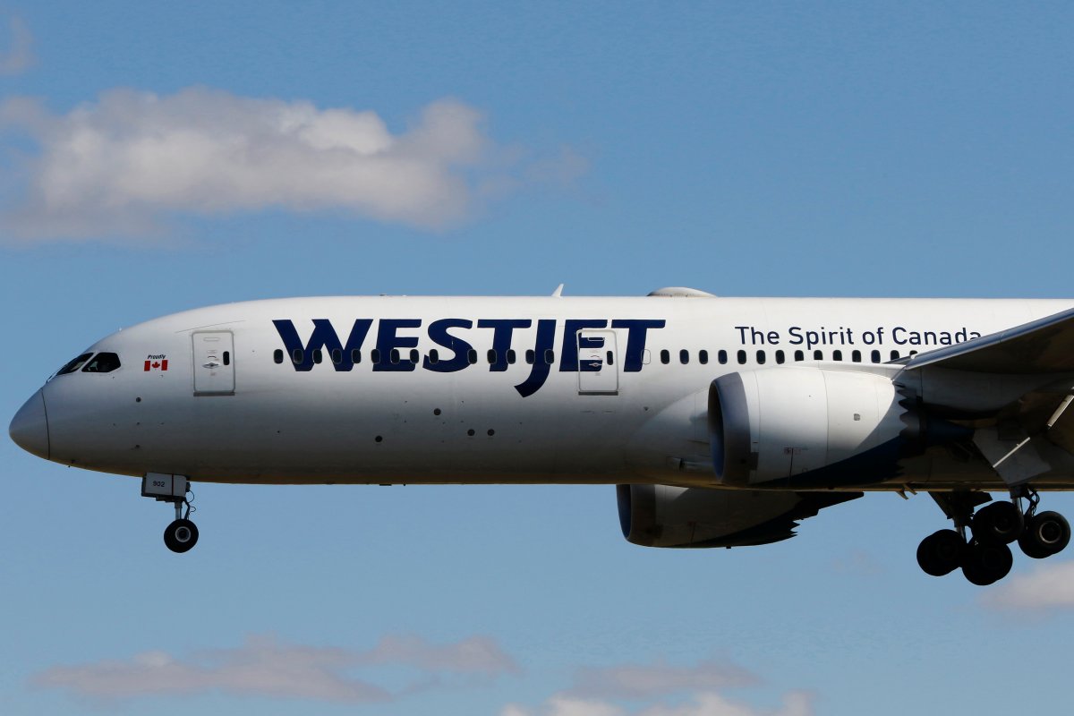 A WestJet Airlines flight lands in Calgary, Alberta on Sept. 20, 2022. 