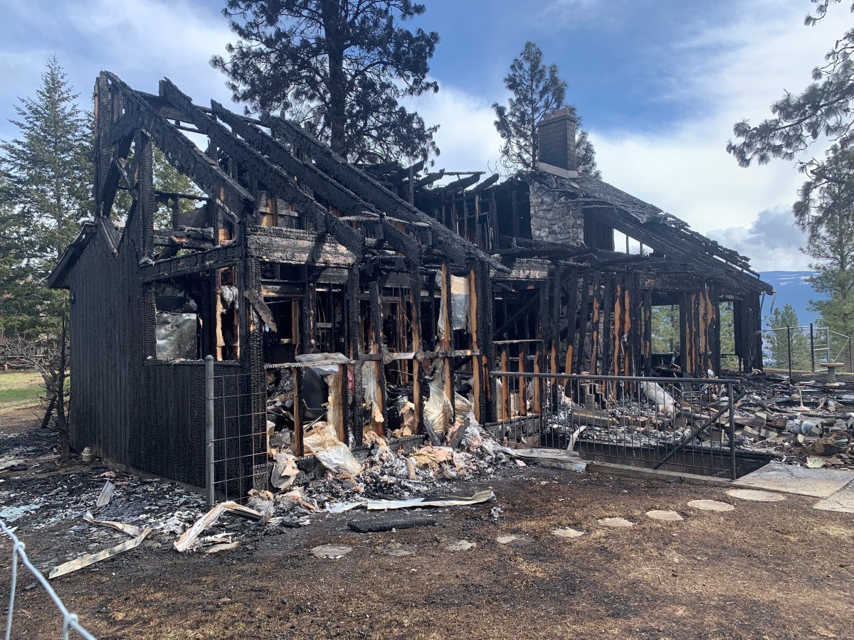 A Summerland woman died Monday in a house fire.