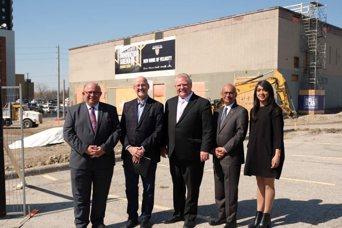 Kitchener Mayor Berry Vrbanovic, angel investor Mike Stork, Ontario Premier Doug Ford, University of Waterloo president Vivek Goel and MP Bardish Chagger stand before the new Innovation Arena in downtown Kitchener. 