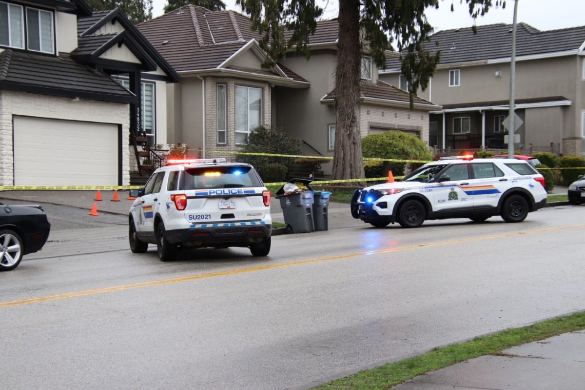 Surrey RCMP officers respond to reports of a shooting near 76th Avenue and 148th Street on Mon. April 17, 2023.