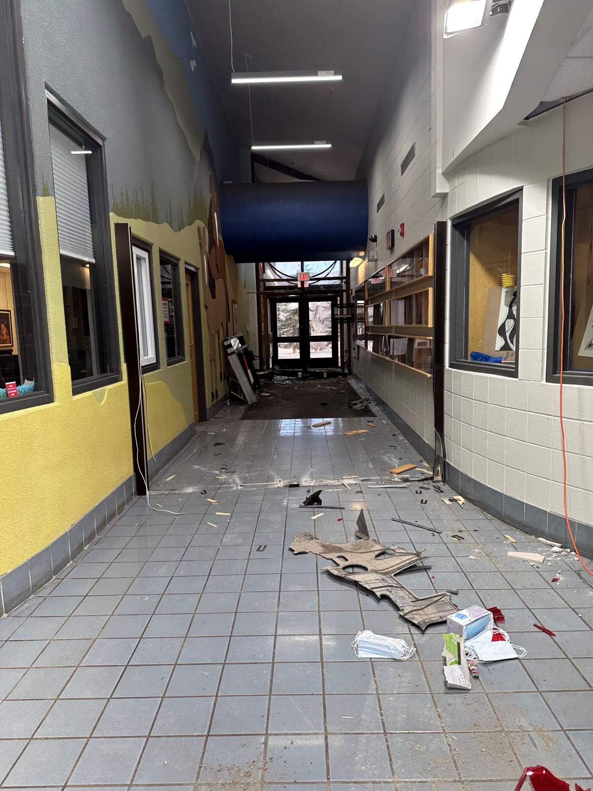 Police estimate over $150,000 in damages was done after a driver drove through the hallways of a school outside of Cochrane, Alta.