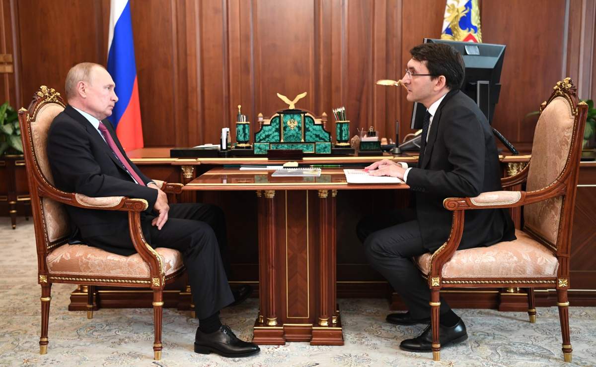 Russian president Vladimir Putin, left, meets with his censorship czar Andrei Lipov, Aug. 10, 2020.