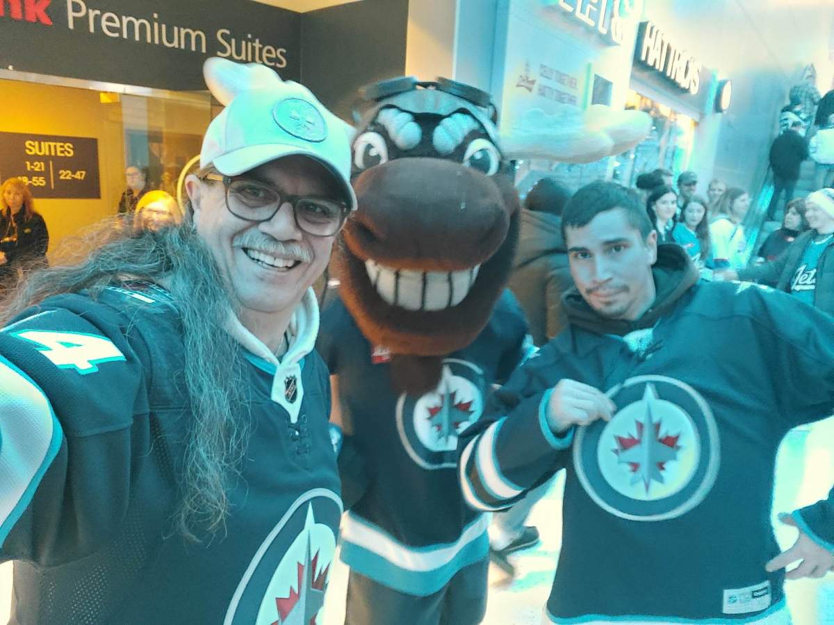 Joseph and Harlan at a Jets game