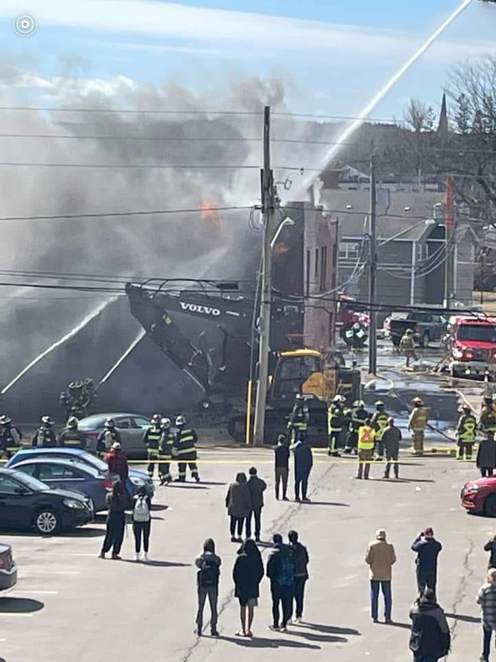 Photos and videos posted to social media show crews battling the fire from all angles.