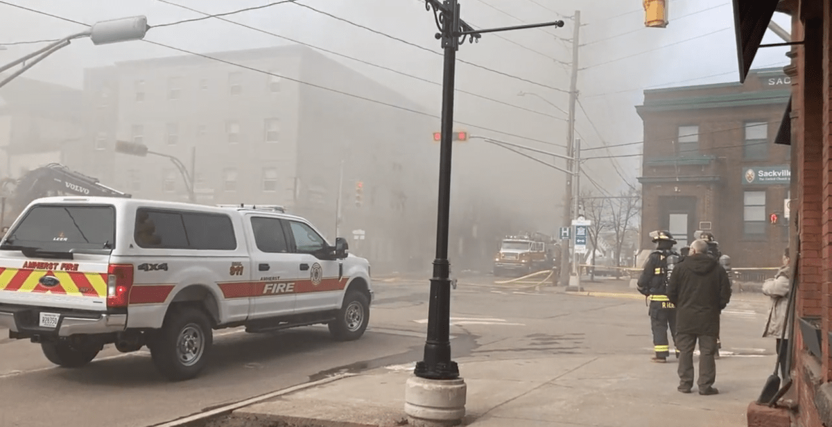 Fire crews are battling a fire in downtown Sackville, N.B., that has engulfed the area in smoke.
