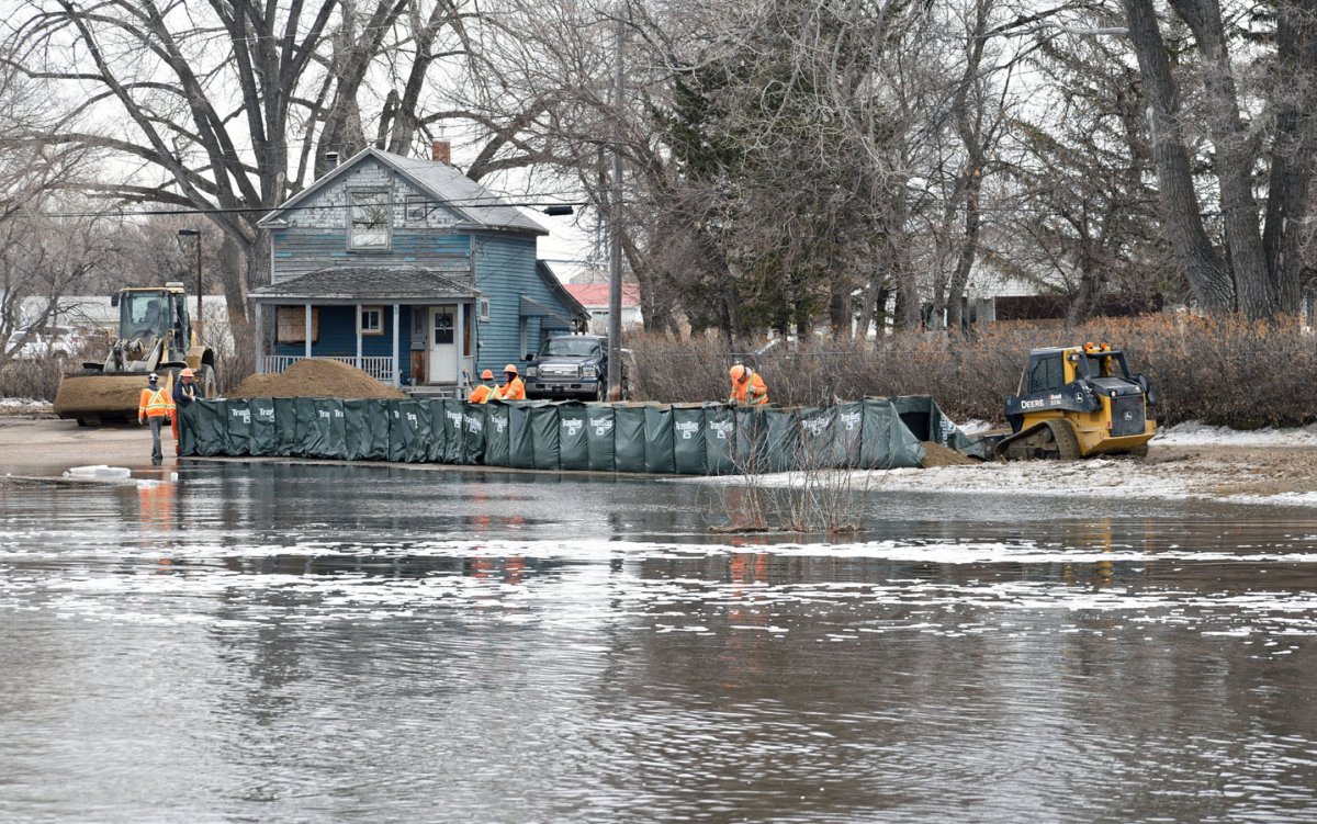 The water levels of Swift Current Creek rose rapidly on Tuesday prompting mayor Al Bridal to declare a state of emergency for the local area. .