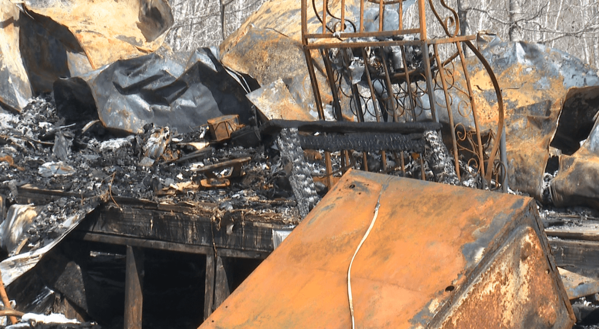The charred remains of what once was a residential trailer.