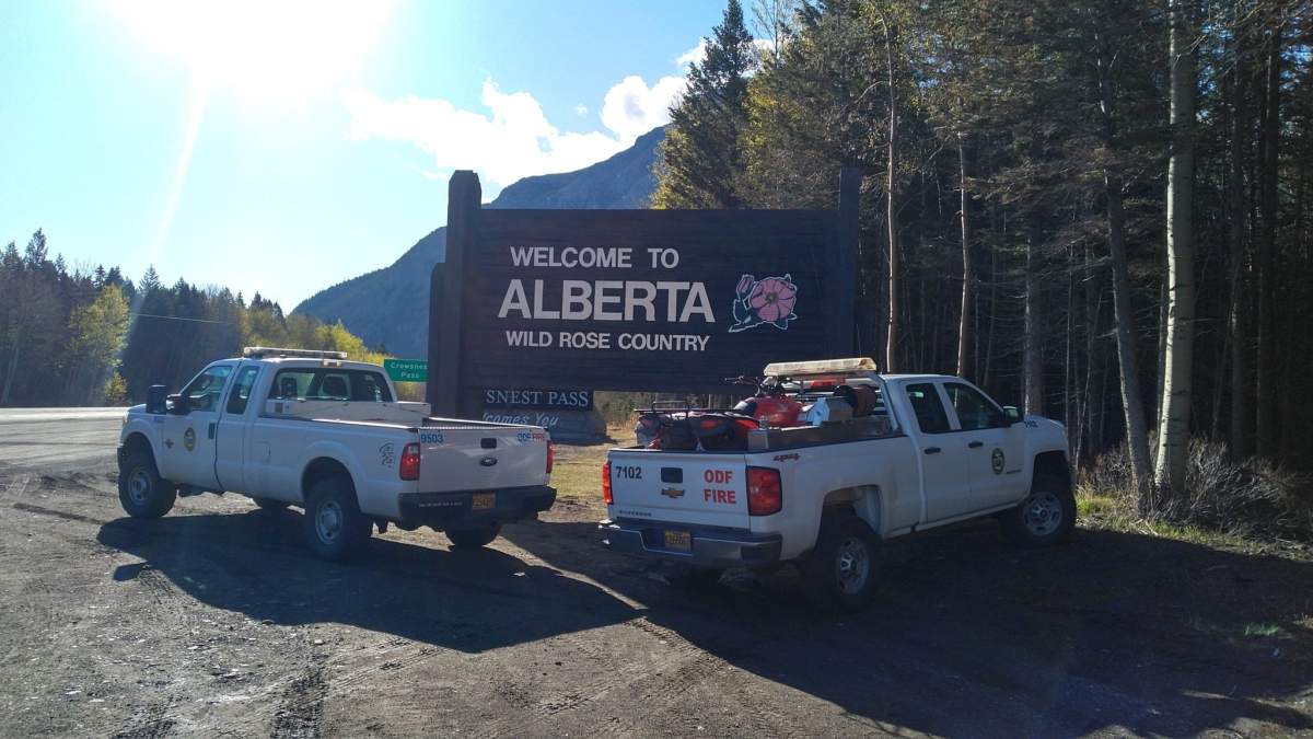 Firefighters with the Oregon Department of Forestry arrive in Alberta to help fight wildfires on May 9, 2023.